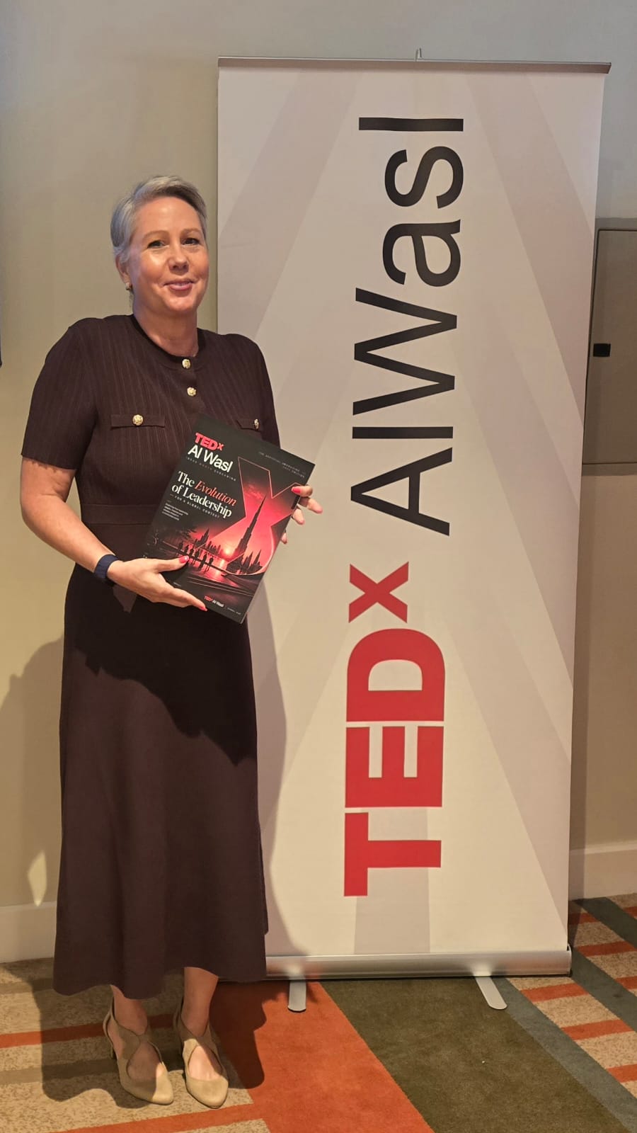 Natalie Gleeson presenting on stage